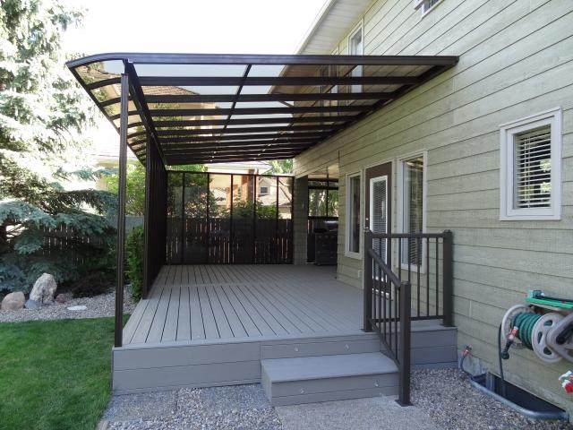 Sunview-Solariums_transparent-curved-end-patio-cover.jpg